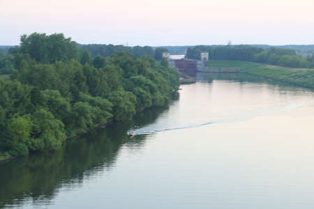Green banks of the Volga and the channel gateway, July, 2021, green background