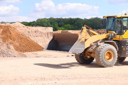Quarry forklift in a quarry for mining pebbles, quarry machinery, background