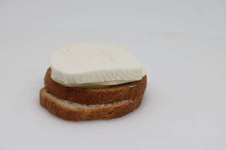 Butter and goat cheese sandwich, dietary product.の写真素材
