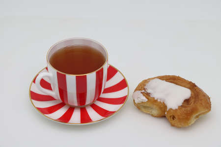 Red teacup. light background. Health food. The concept of a healthy lifestyle