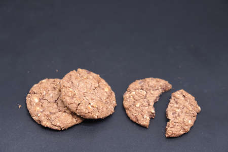 Chocolate chip cookies with nuts on the scales. Weight loss, diet and weight control. Health food....