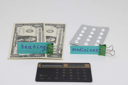 Dollar bills inserted into the radiator slots of the heating system, the increase in the cost of...