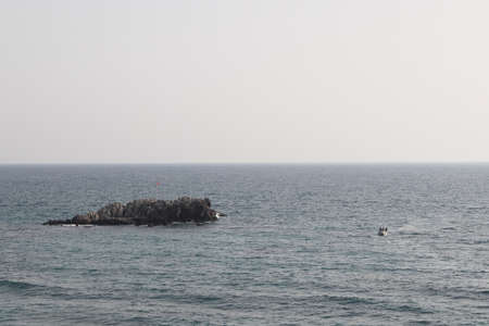 Exposed granite rocks among the sea, Turkish Mediterranean coast, Alanya November 2022