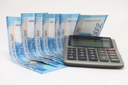 calculator and Swiss francs 50A number of Russian banknotes and a calculator, accurate financial...
