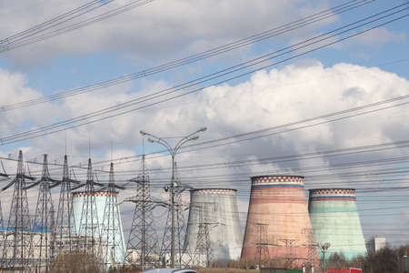 Silhouette High voltage electric tower on the background of the power plantの写真素材