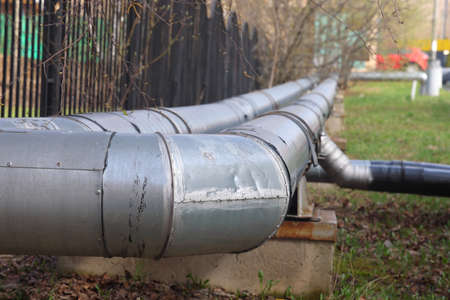 Overground heat pipes. Pipeline above the earth conducting heat for heating city