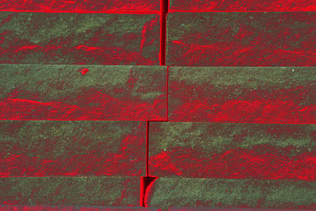 Rough facing brick, altered colors, colorful background in soft pastel colors. Smooth brickwork texture for backgroundの写真素材