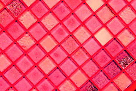Close-up of a reflected glass facade with a rectangular grid system. Abstract background of architectural geometry elements with urban metropolis concept, modified color schemeの写真素材