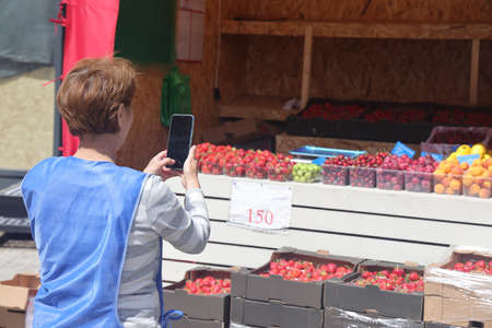 Strawberries for sale. street trade. control shot. Fragrant strawberries on the market counter....