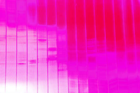 background of glass windows of a modern office building, glass facade, changed color schemeの写真素材