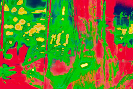 The play of light on uneven glass surfaces. Abstract background in soothing colors. Changed color schemeの写真素材