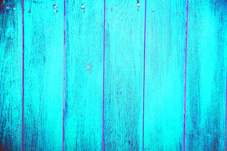 Vertical wooden boards painted with beige paint for background. Changed color schemeの写真素材