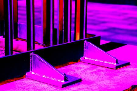 Fastening a steel structure or structures to concrete. Changed color scheme. colorful background