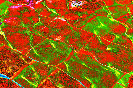 Background of glare of sunlight in a fountain with a stone bottom. Changed color scheme. colorful...