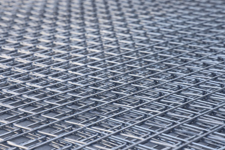 A stack of steel gratings used in industry. industrial background