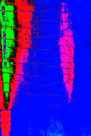 Surface texture with cracks. Lots of small cracks in the paint. Old metal wall. Changed color scheme