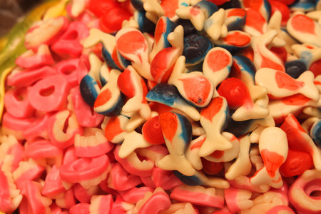 texture of sweet lollipops, heap of sweets candies, lollipops for saleの写真素材