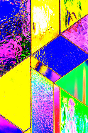 abstract background consisting of multicolored glass squares in a row, colored glass background and...