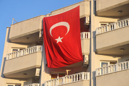 Turkey flag. National flag of Turkey with old white houseの写真素材