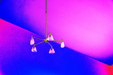 Ceiling lamp in blue and yellow color, closeup of photo/