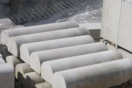 concrete blocks on a construction site, details of building materials of a special shape for the restoration of the temple.の写真素材