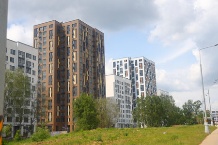 Moscow residential areas are buried in greenery, new buildings, Potapovo metro area, July 2025の写真素材