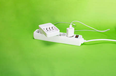 Top view of extension block on green B background. copy space