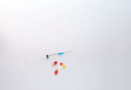medical syringe and pills are differentの写真素材