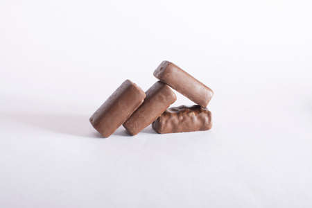 chocolate candies on colored backgroundの写真素材