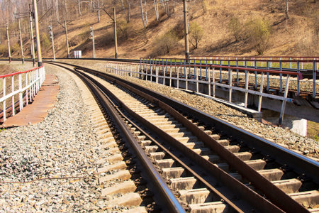 railroad rails with concrete sleepers.の写真素材