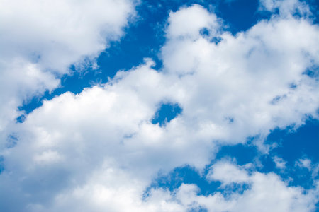The sky is blue, the clouds are biggerの写真素材
