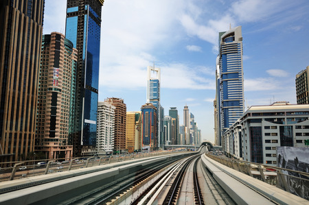Dibai metro going through the skyscrapers.のeditorial素材
