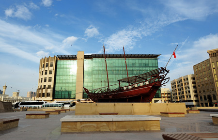 A dhow a wooden boat in the courtyard of Dubai Museum.のeditorial素材