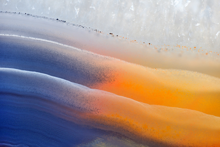 Background with slice of natural stone agate.の写真素材