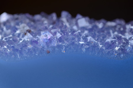 Background with slice of natural stone agate.