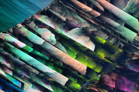 Photo through a microscope of crystals growing from the melt of sulfur. Polarized light technology....