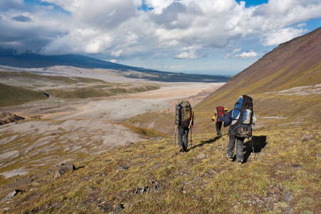 Hikers on volcano land in Kamchatka, Russia.の写真素材
