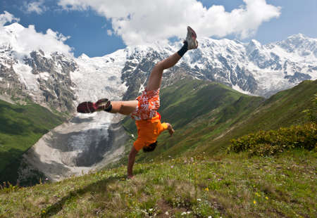 Happy hiker near mountains, Georgia.の写真素材