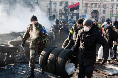 KIEV, UKRAINE - 23 JANUARY 2014: Unknown demonstrators at the Independence square during Ukrainian...