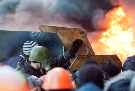 KIEV, UKRAINE - 23 JANUARY 2014: Unknown demonstrators at the Independence square during Ukrainian...