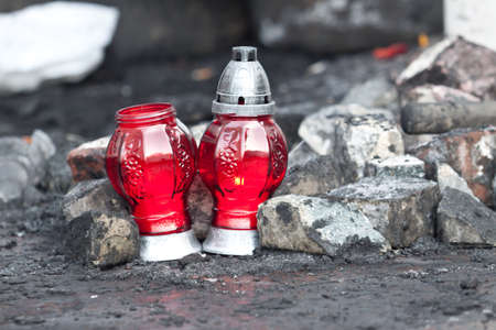 KIEV, UKRAINE - 25 JANUARY 2014: Candles in honor of the dead at the Grushevskogo street near...