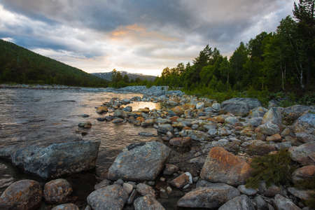 Sunset over river and fjord, Norway.の写真素材