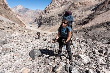 Hikers in high mountains, central asia, Tajikistan.の写真素材