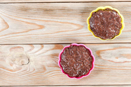 Chocolate cakes with crispy top on Wood Table Background,の写真素材
