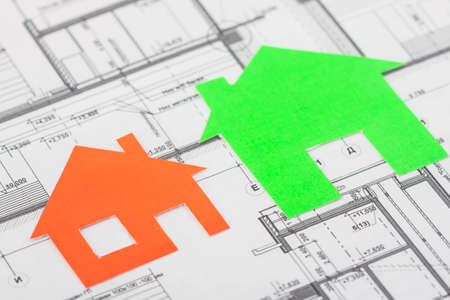 Model house on construction plan for house building. Real Estate Concept.の写真素材