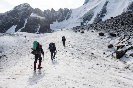 Group of hikers in Tien Shan mountains, central asia, Kyrgyzstan.の写真素材