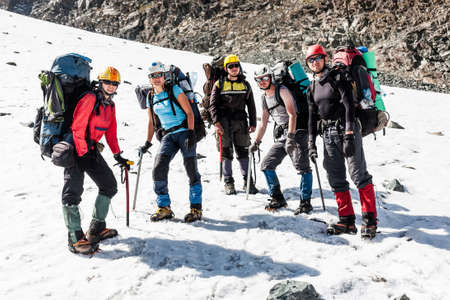 Group of hikers in Tien Shan mountains, central asia, Kyrgyzstan.の写真素材