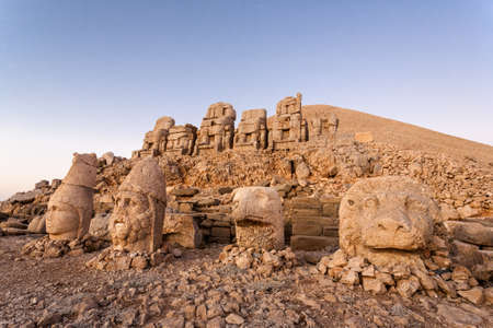 Toppled heads of the gods on East terrace at the top of Nemrut dagi in Turkey. The UNESCO World Heritage Site at Mount Nemrut where King Antiochus is reputedly entombed.の写真素材