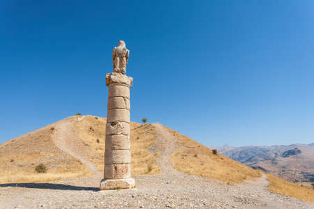 View of Karakus Tumulus, ancient historical and blessed area of Nemrut National Park, on clear blue sky background.の写真素材