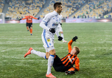 Kiev, Ukraine - December 12, 2016: Yevhen Khacheridi of Dynamo Kyiv fighting for the ball with...